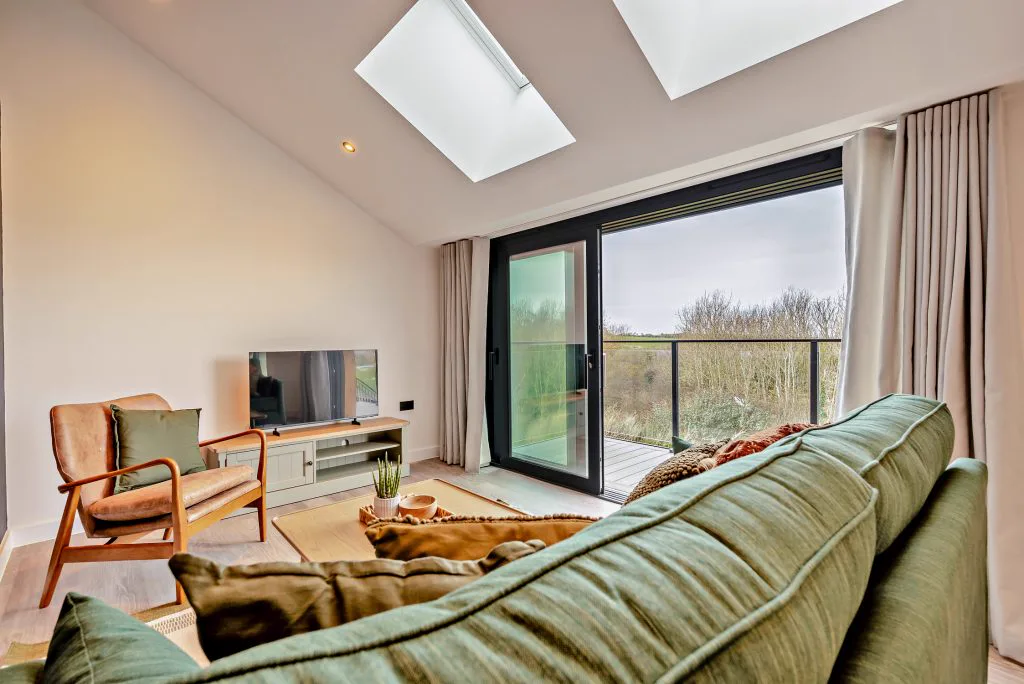 Arvor Suite interior — modern, calm self-catering suite with countryside views at Whalesborough Farm